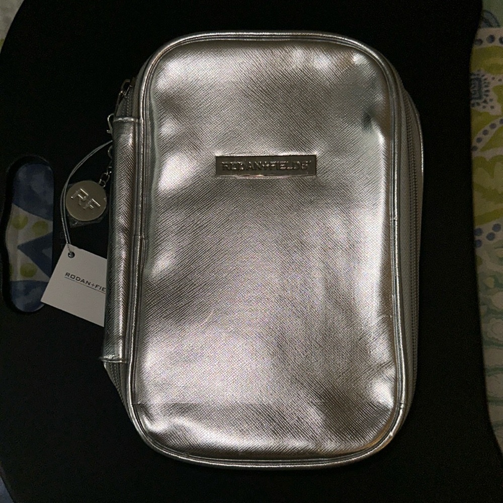 Rodan+Fields Metallic dual compartment makeup/toiletry/cosmetic bag